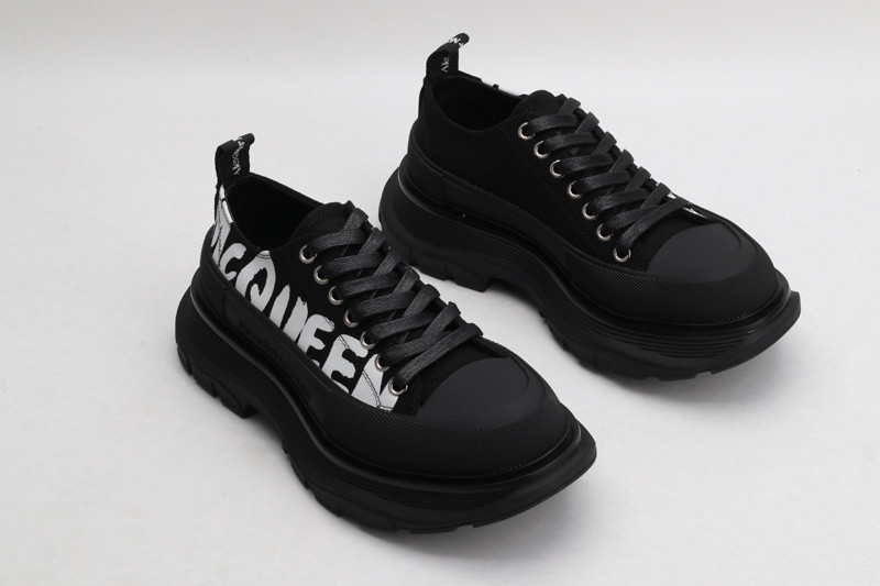 alex mcq tread slick lace up in black with letters