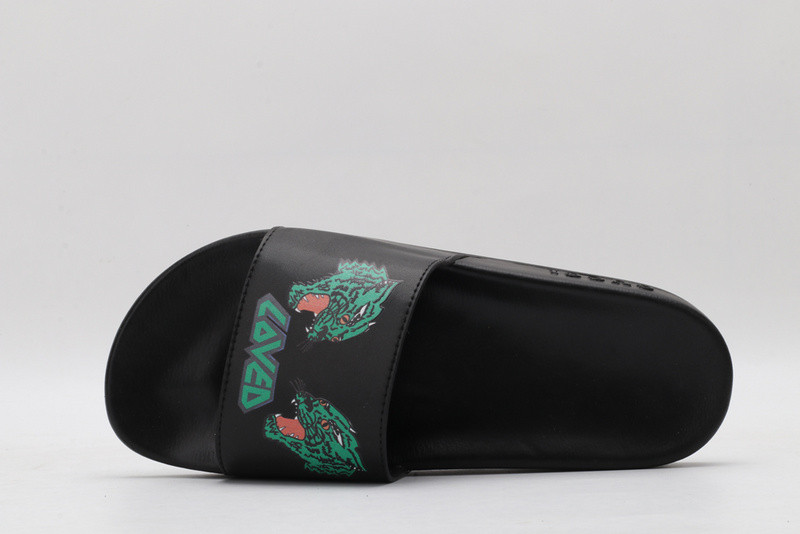 G*u*i slides all black with green tiger