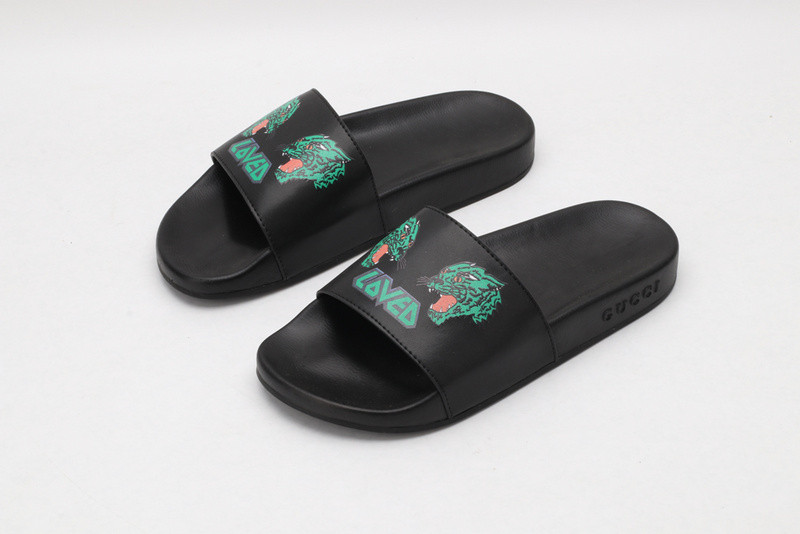G*u*i slides all black with green tiger
