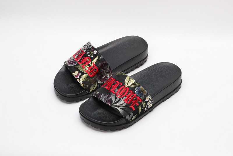 G*u*i slides all black with flower