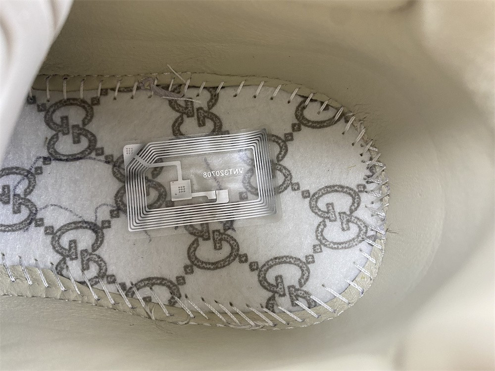 G*u*i sneakers